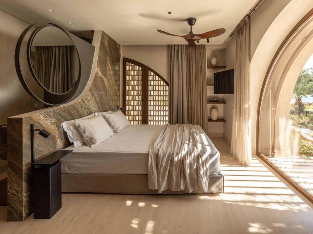 Crete House Villa by Entopos Architects bed