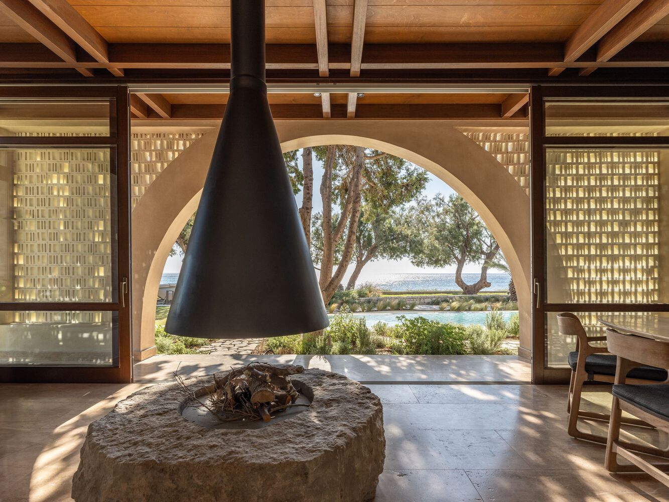 Crete House Villa by Entopos Architects fireplace