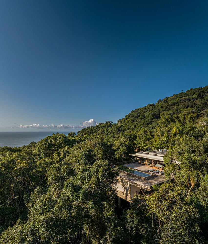 Studio mk27 house design canopy lush vegetation