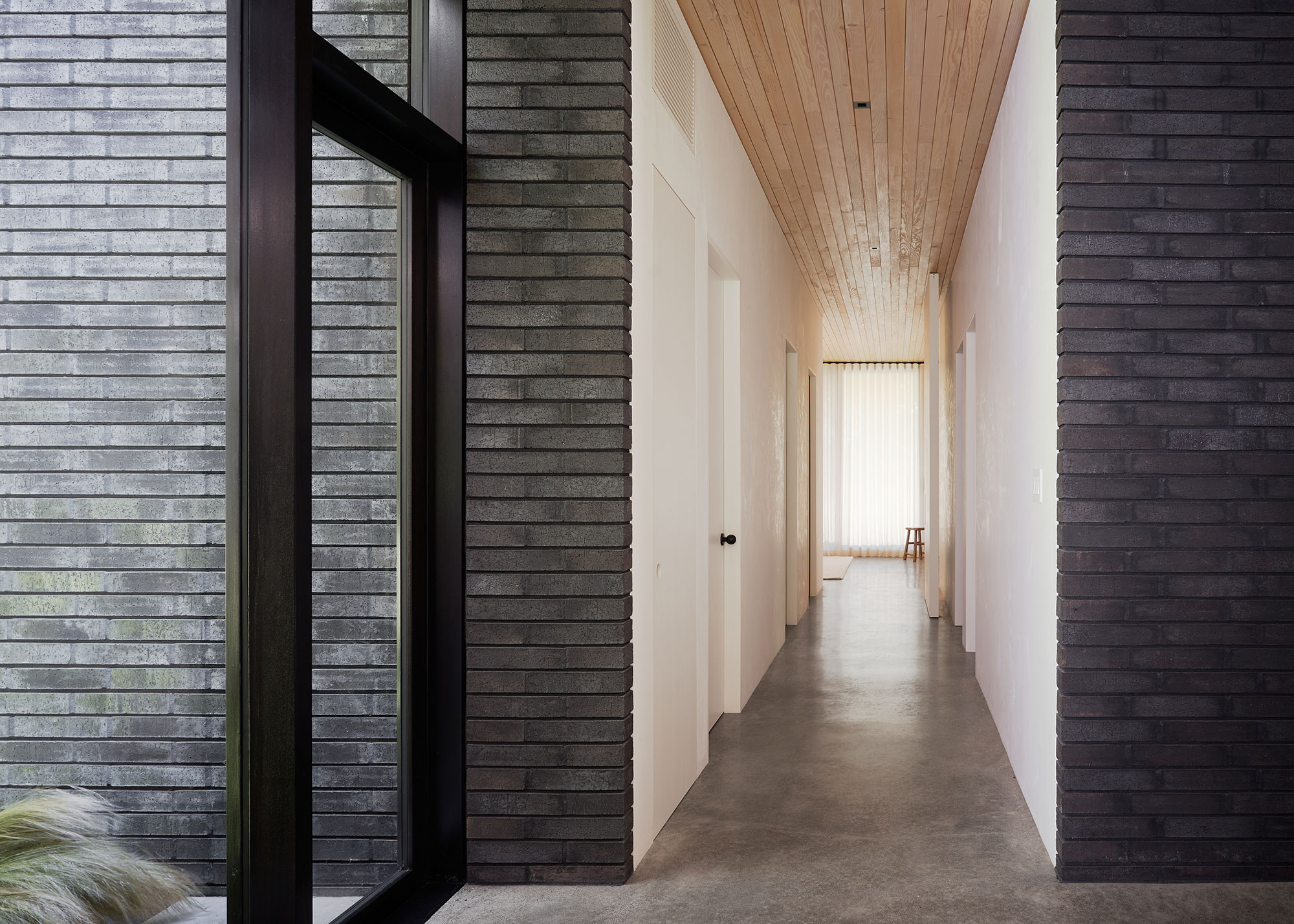 Black Brick House white hall