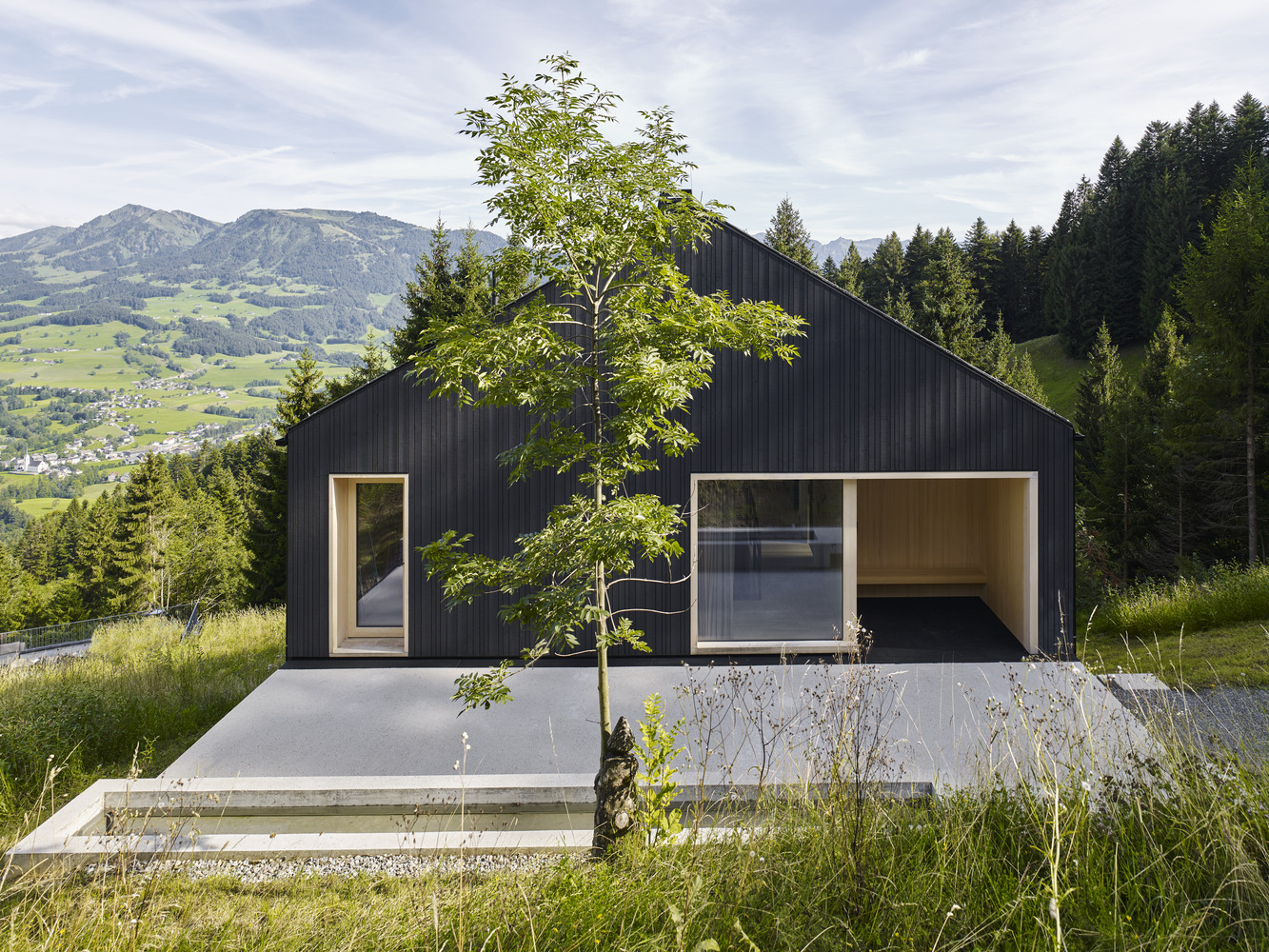 Bregenzerwald Vacation Home from Architektur SCHWEIGHOFER black facade