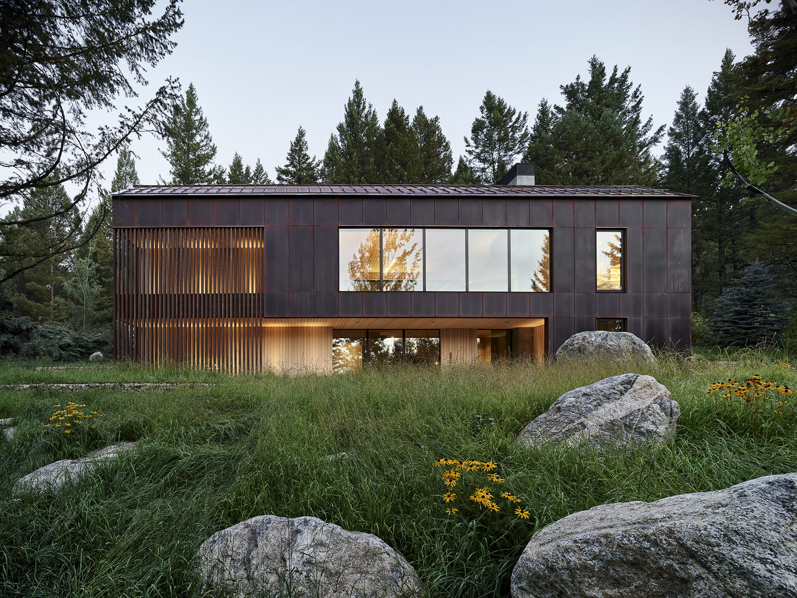 Caju weathered Corten steel house landscape