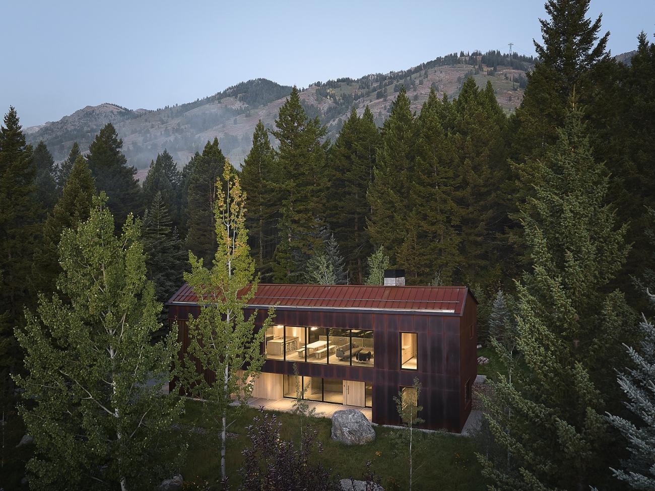 Caju weathered Corten steel house sunset