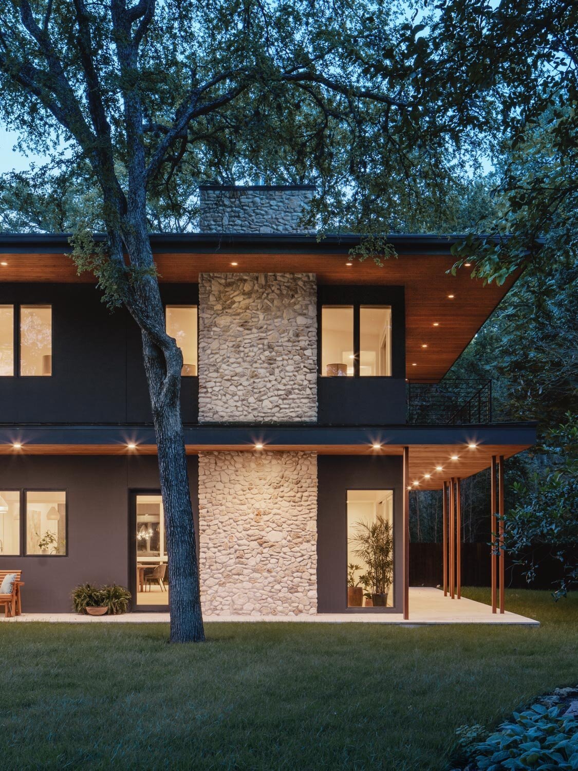 Crestvale Residence from Clark Richardson Architects stacked stone river rocks