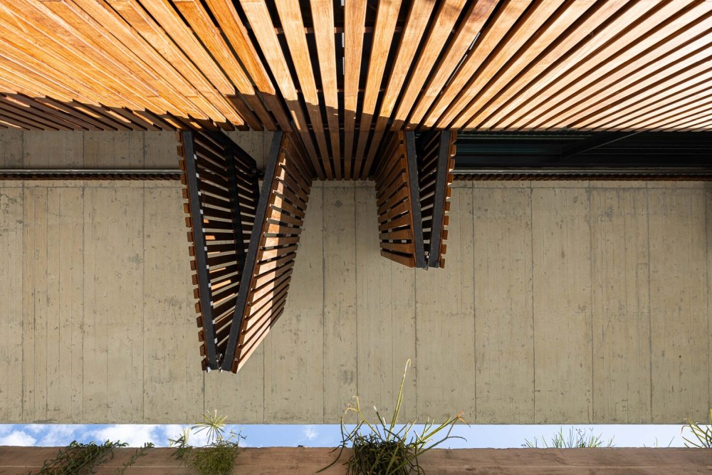 M House Concrete Structure House in Portugal Homedit wooden shutters