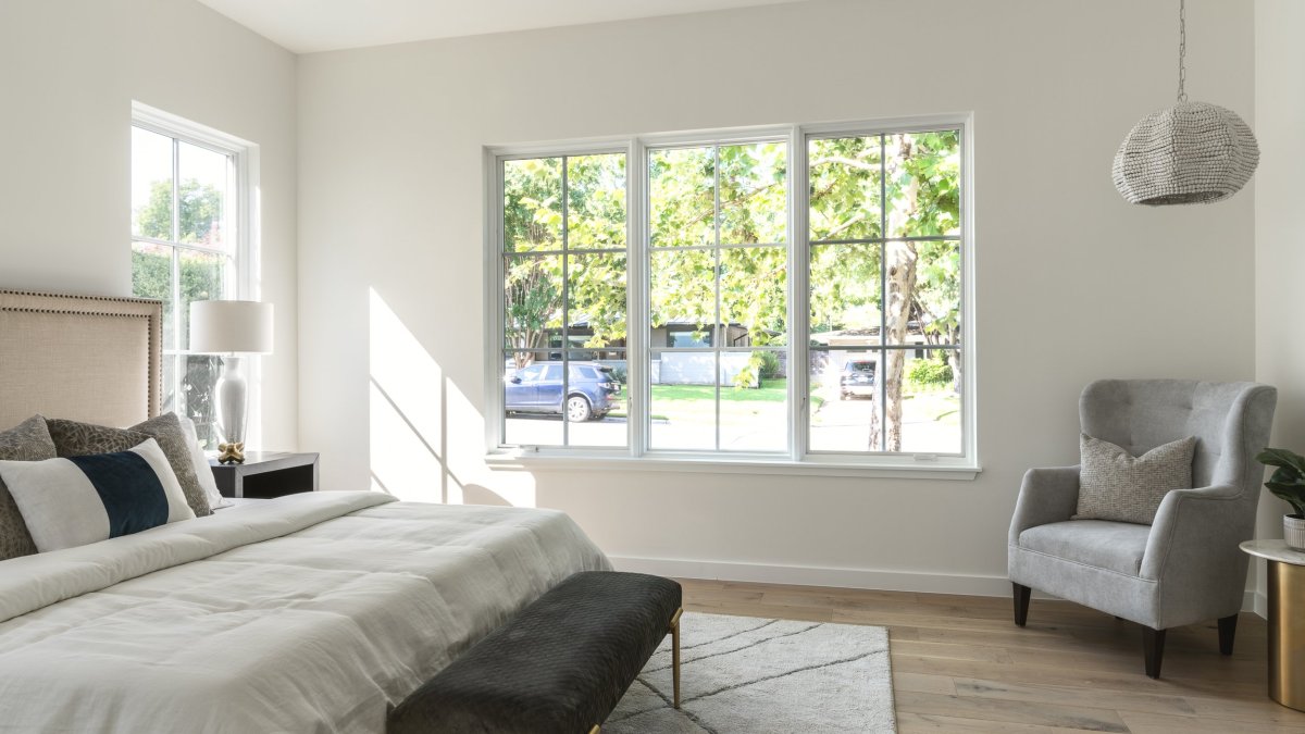 White brick house by Clark Richardson Architects bedroom