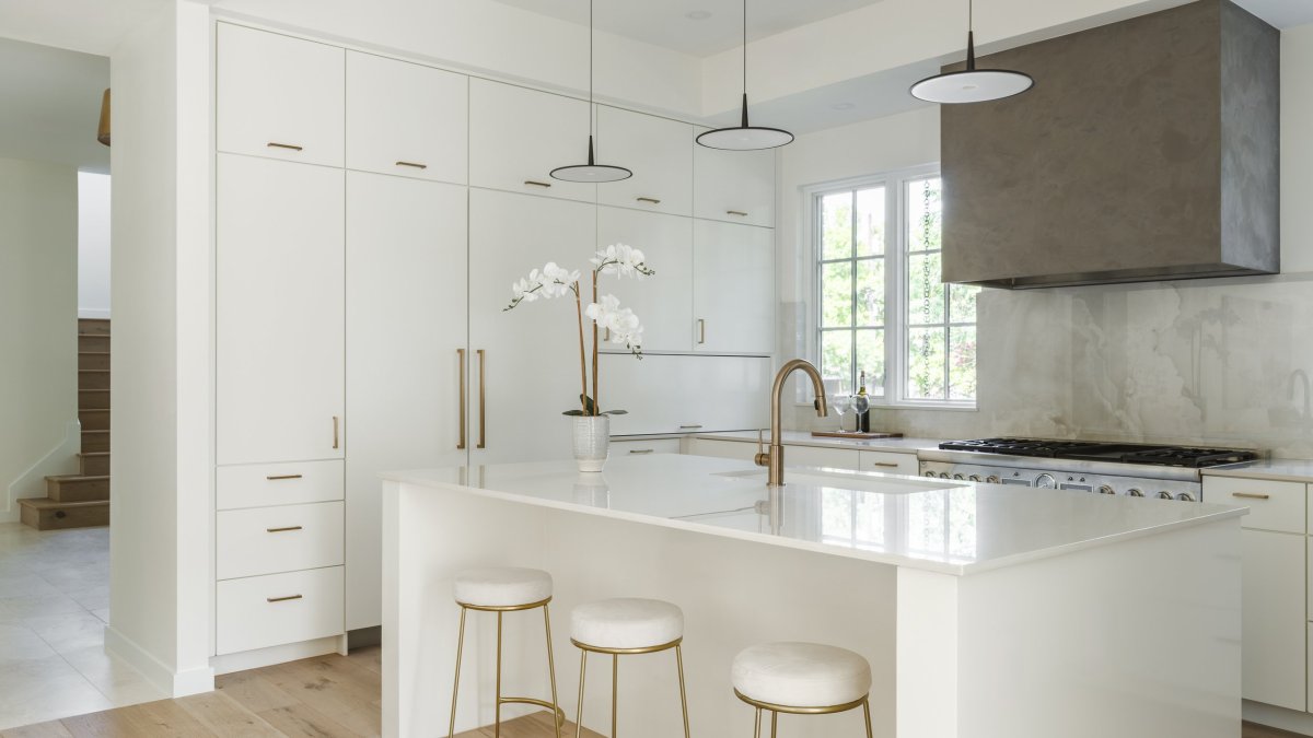 White brick house by Clark Richardson Architects plain white kitchen
