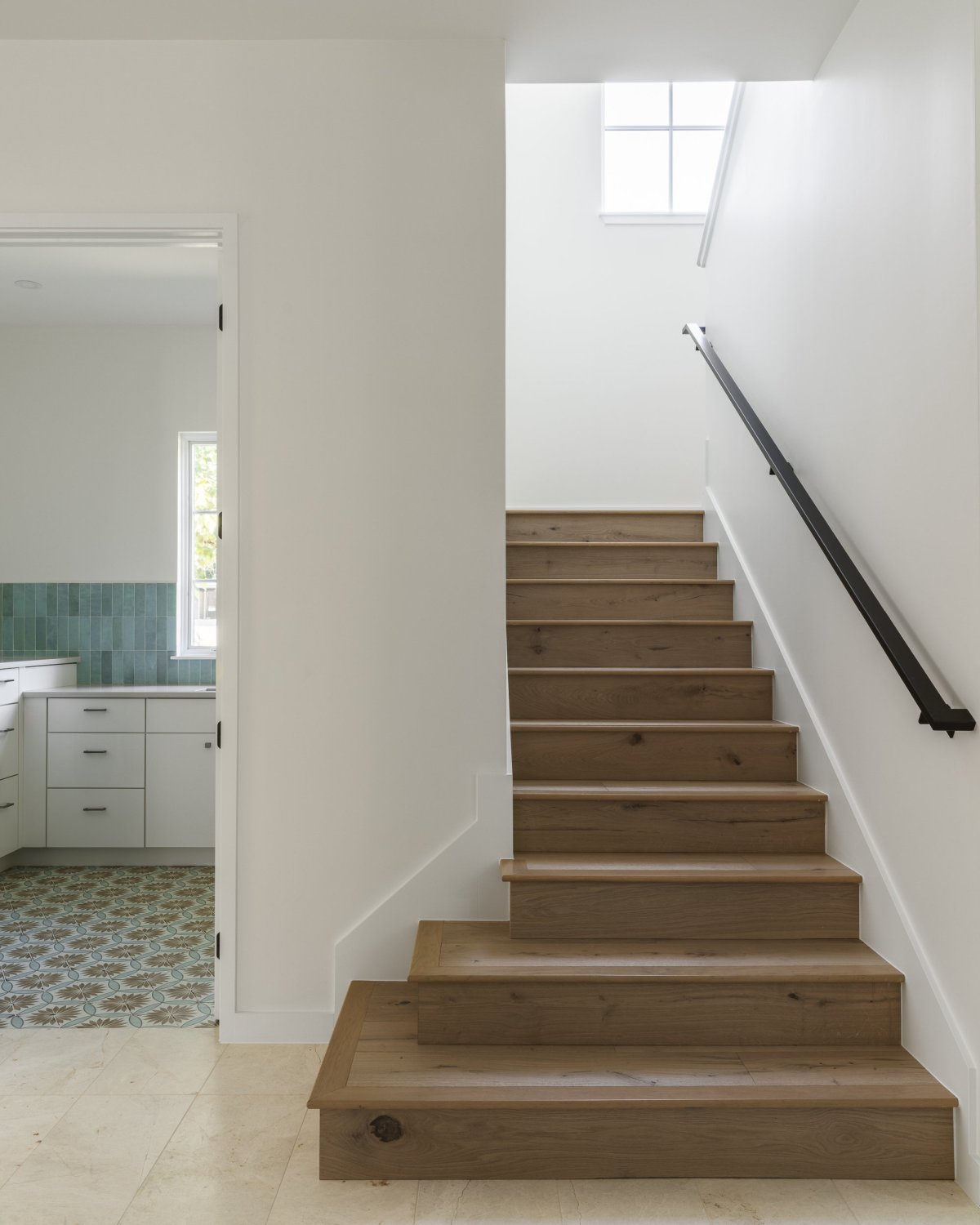 White brick house by Clark Richardson Architects staircase