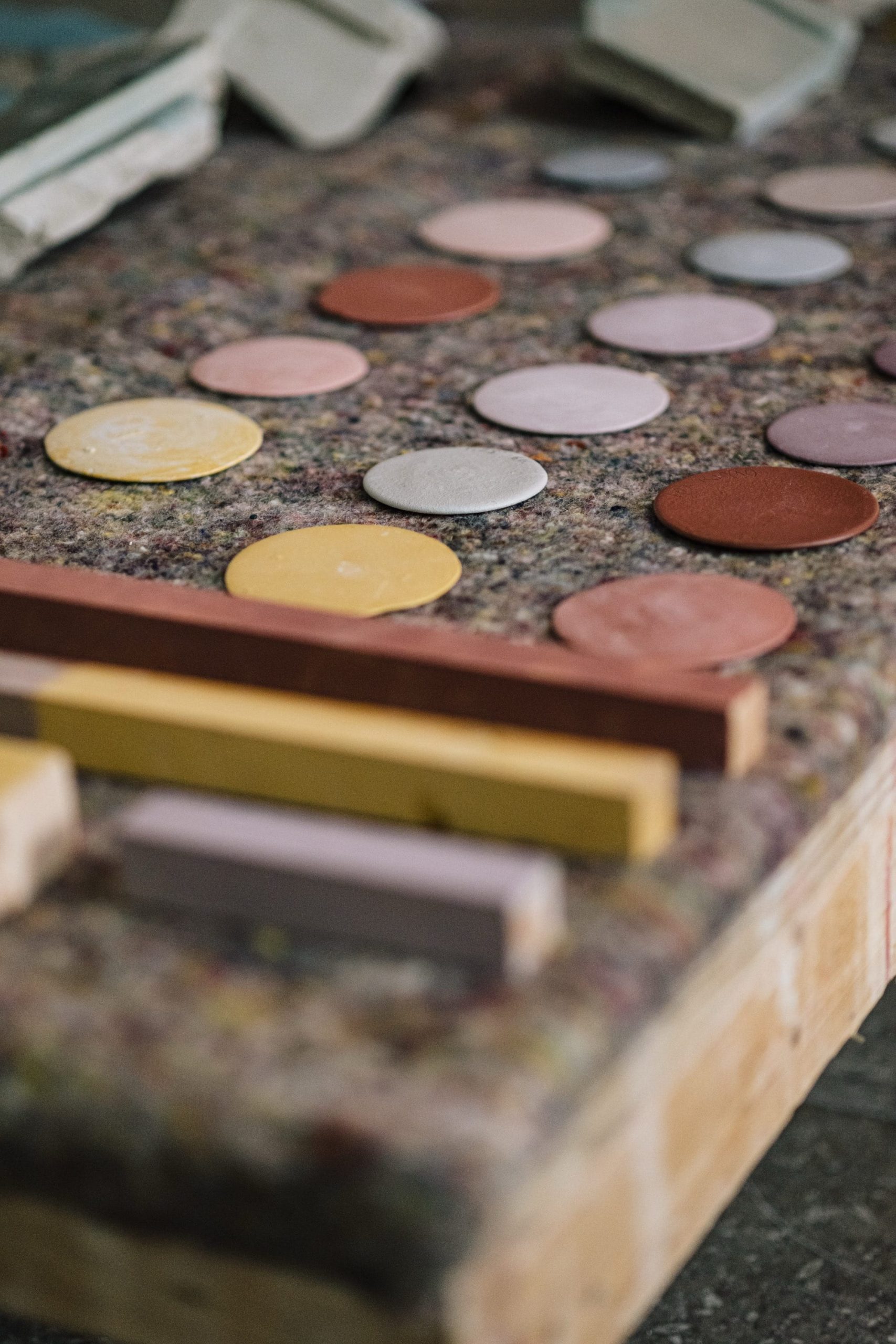 a detail of a sculptural installation with numerous plaster and stone objects