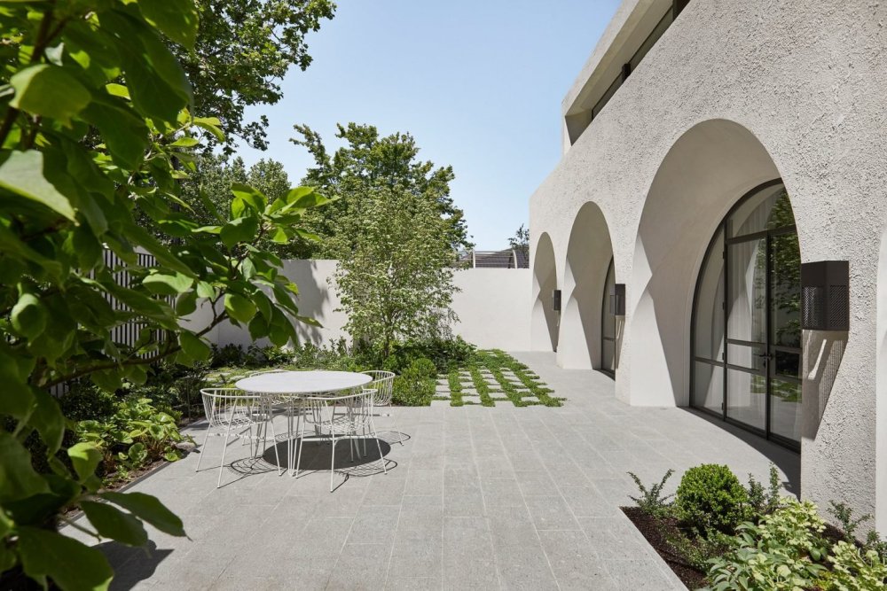 Apartment Complex with Ached Windows Patio