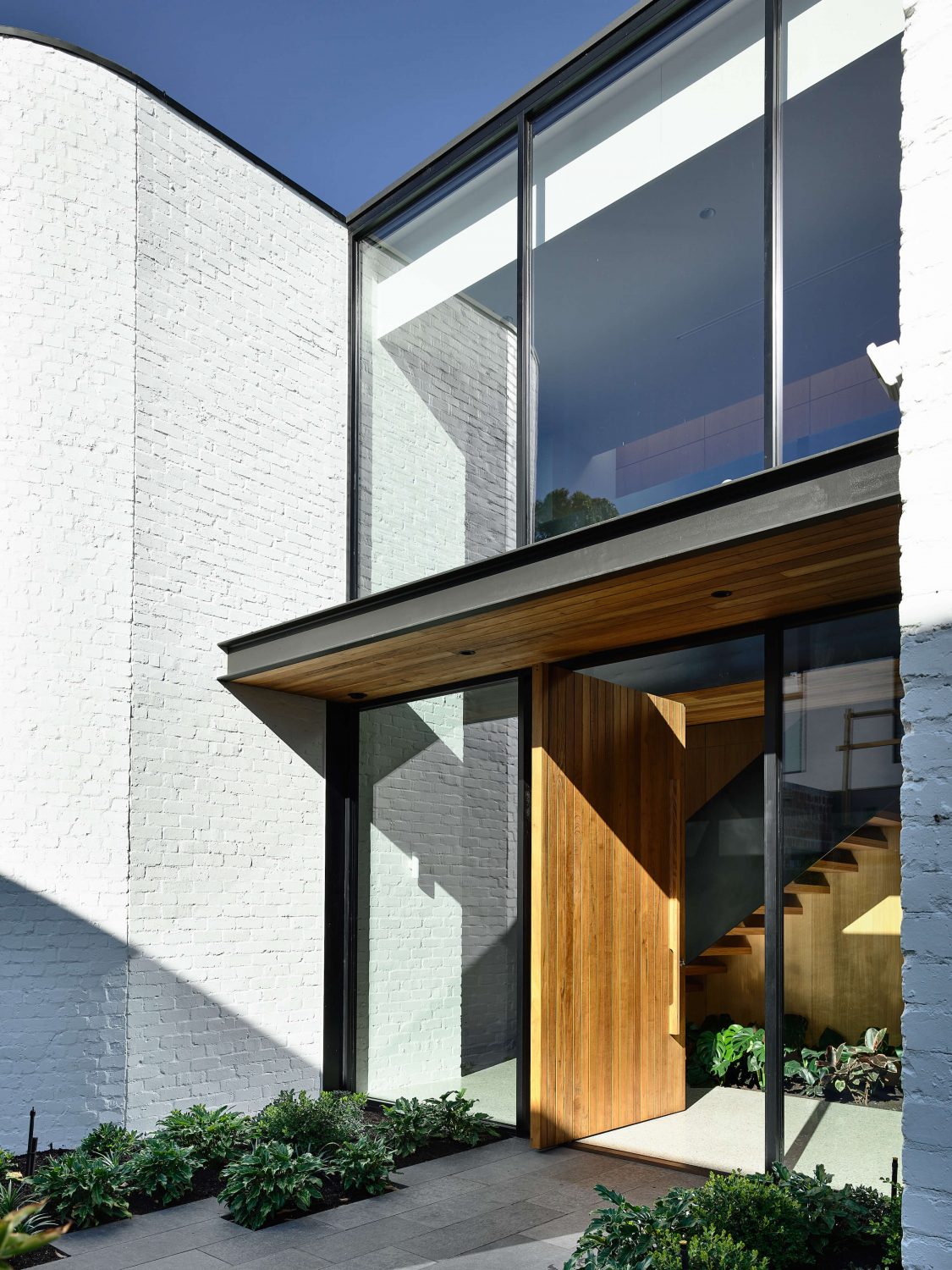 Four bed house by inform entryway