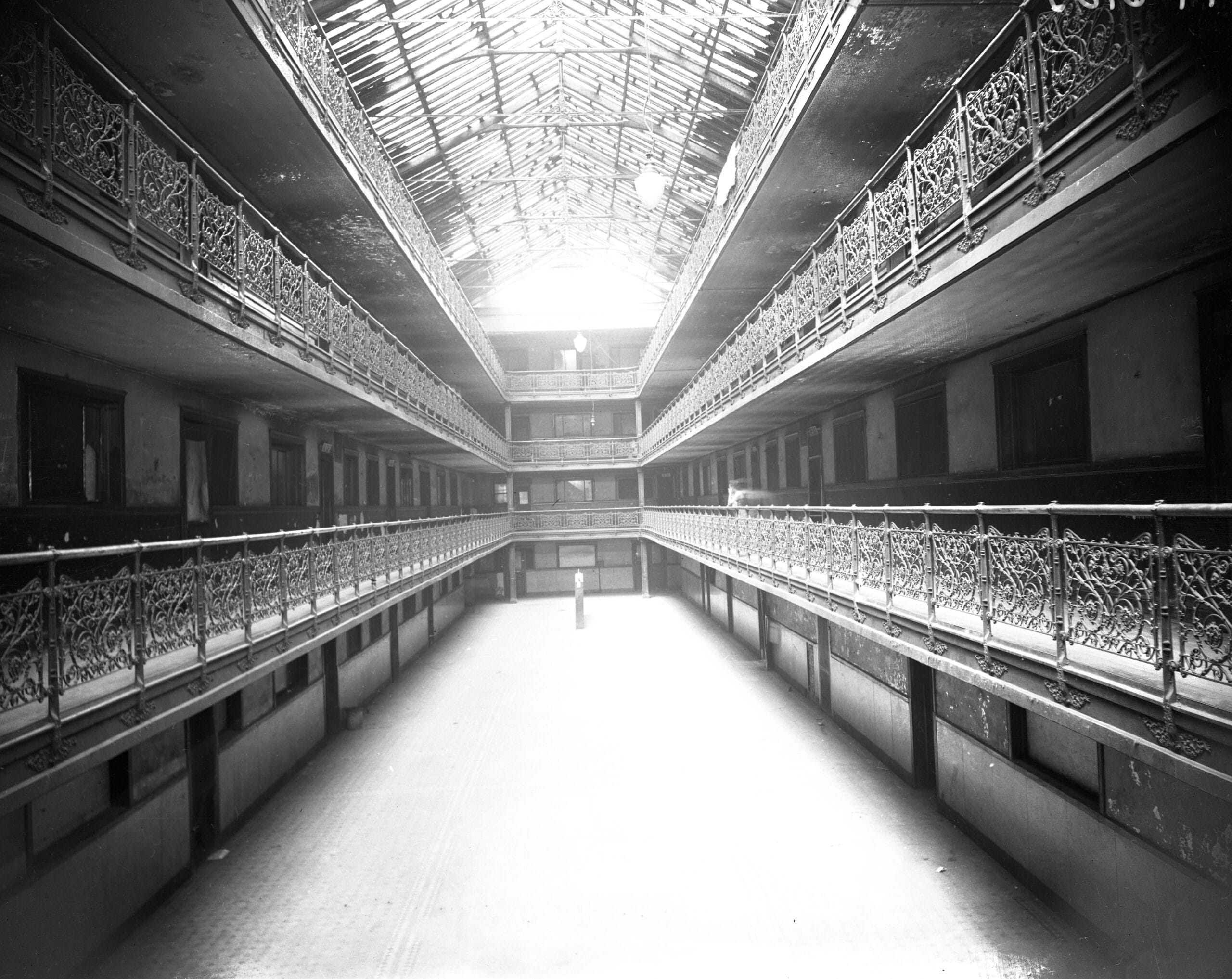 a black and white image of an indoor atrium