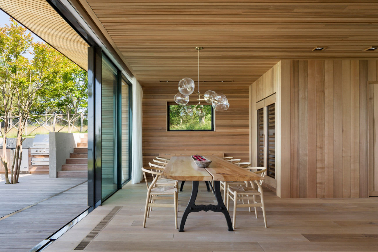 Peconic House Mapos Architecture Live edge wood table and walls in wood