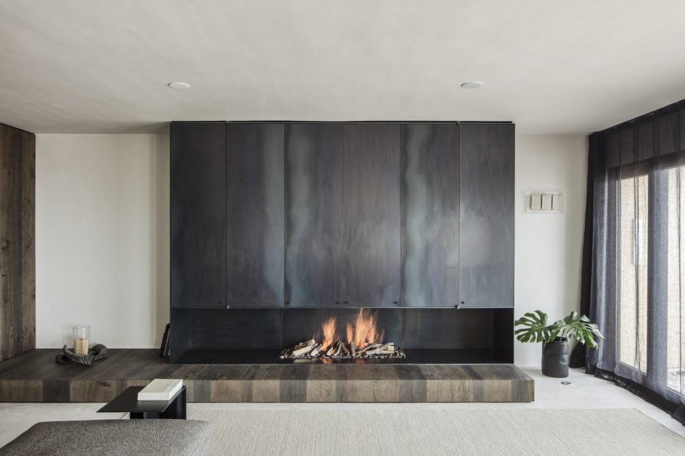 Belgian Arjaan De Feyter Apartment Interior Designe living room fireplace steel