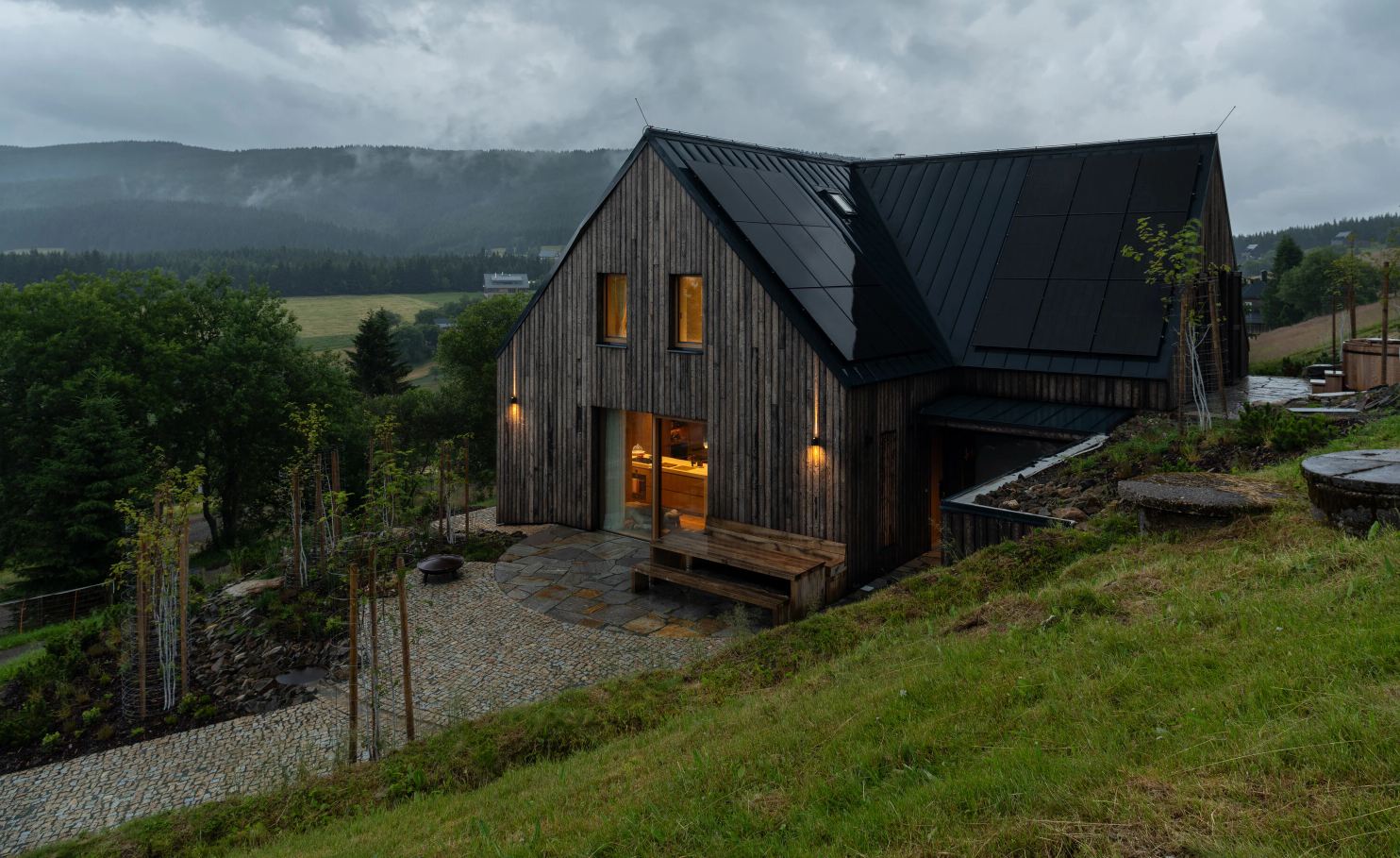 Horni Mala Upa Mountain Chalet OK PLAN ARCHITECTS in Czech Rep sunset