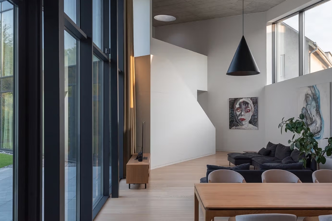 Residential House Kaunas Lithuania white walls decorated with art