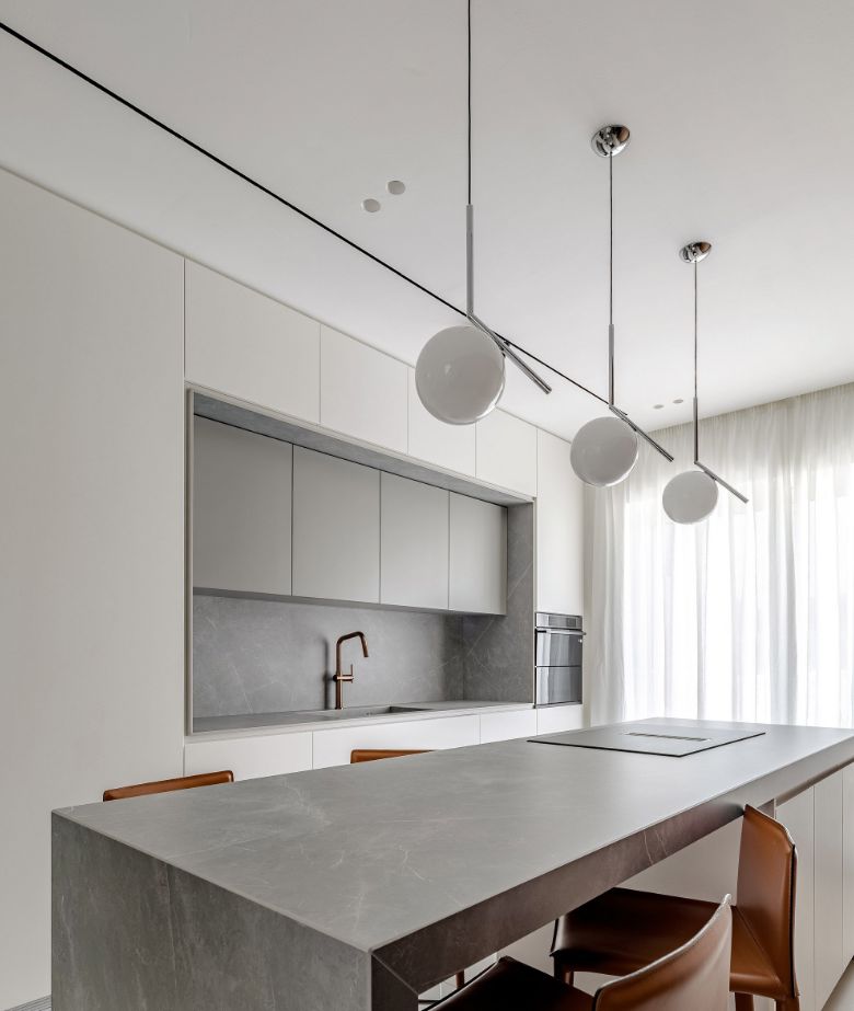 Bari apartment kitchen open space island with leather chairs