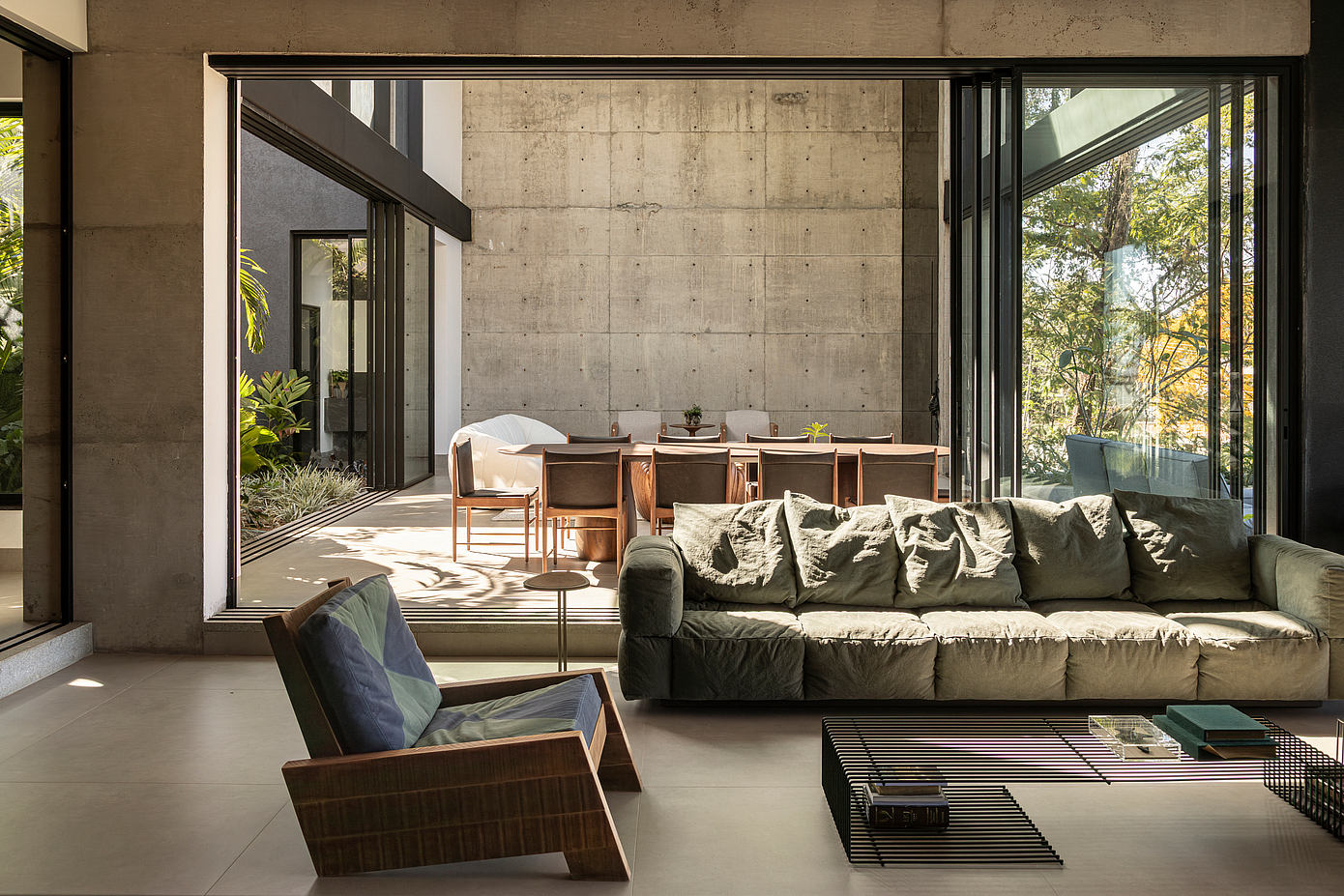 Concrete House by Dayala e Rafael Arquitetos Associado living room sofa