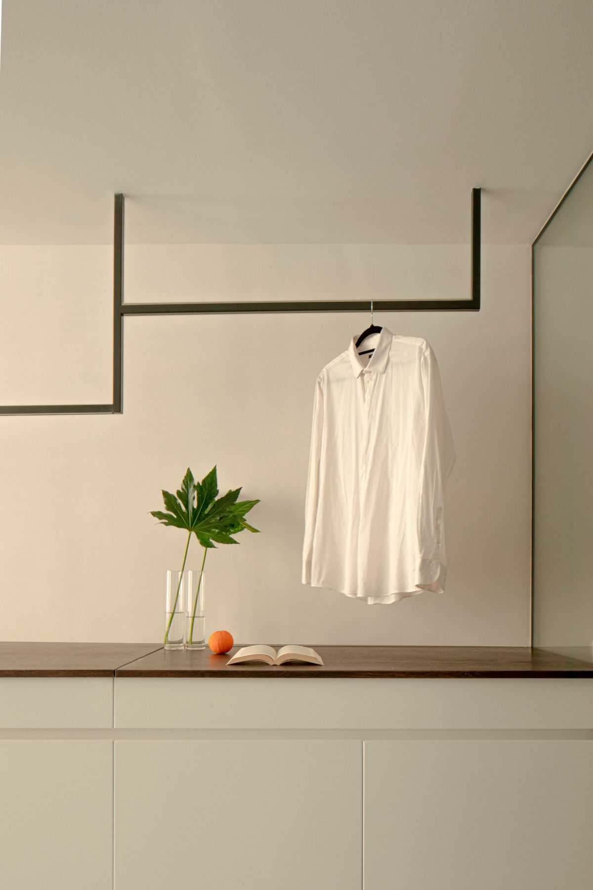 Eligius Interior design by La Leta Architettura hanging racks