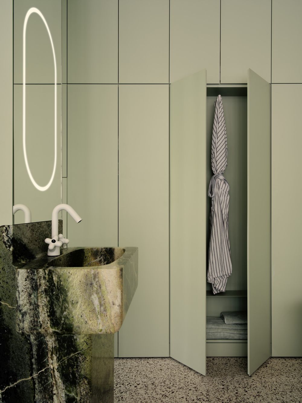 Glassbrick Apartment in Berlin hiding cabinets