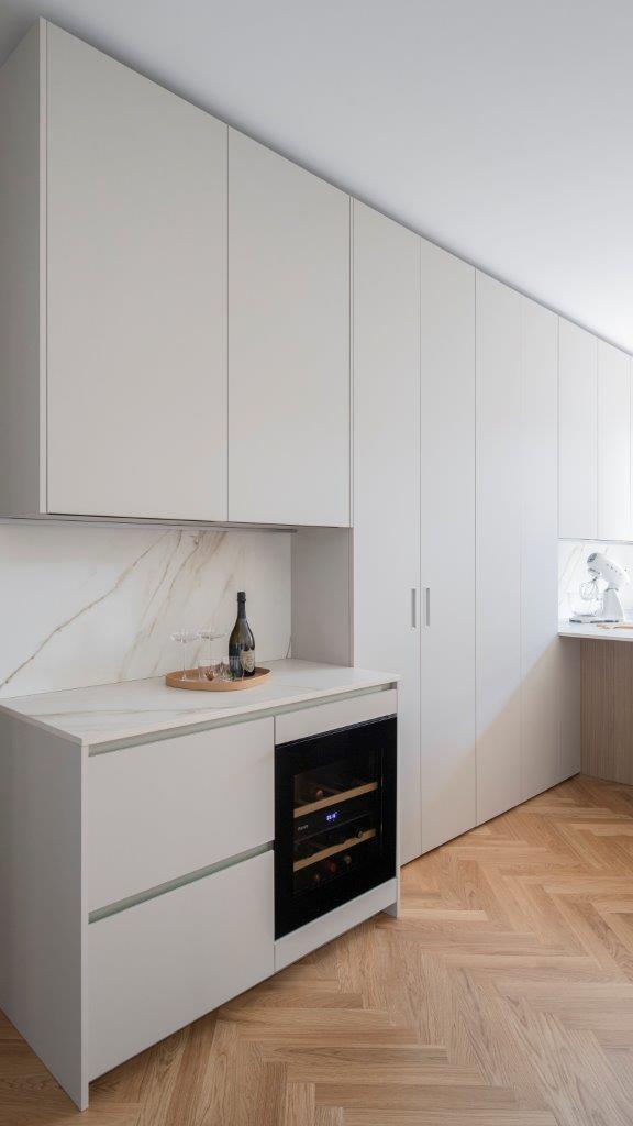 Milan apartment from Gabriela Casagrande white cabinet kitchen