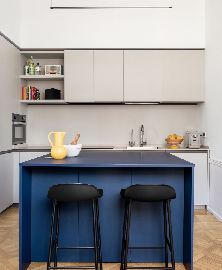 ZaraUno apartment decor by bump studio blue kitchen island