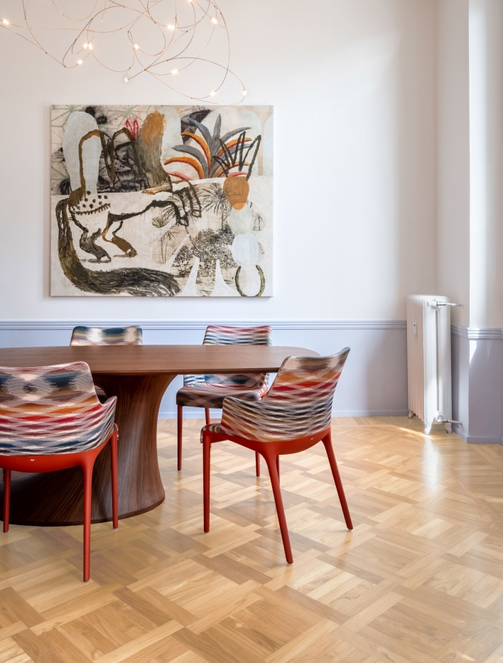 ZaraUno apartment decor by bump studio dining area chairs and wall art