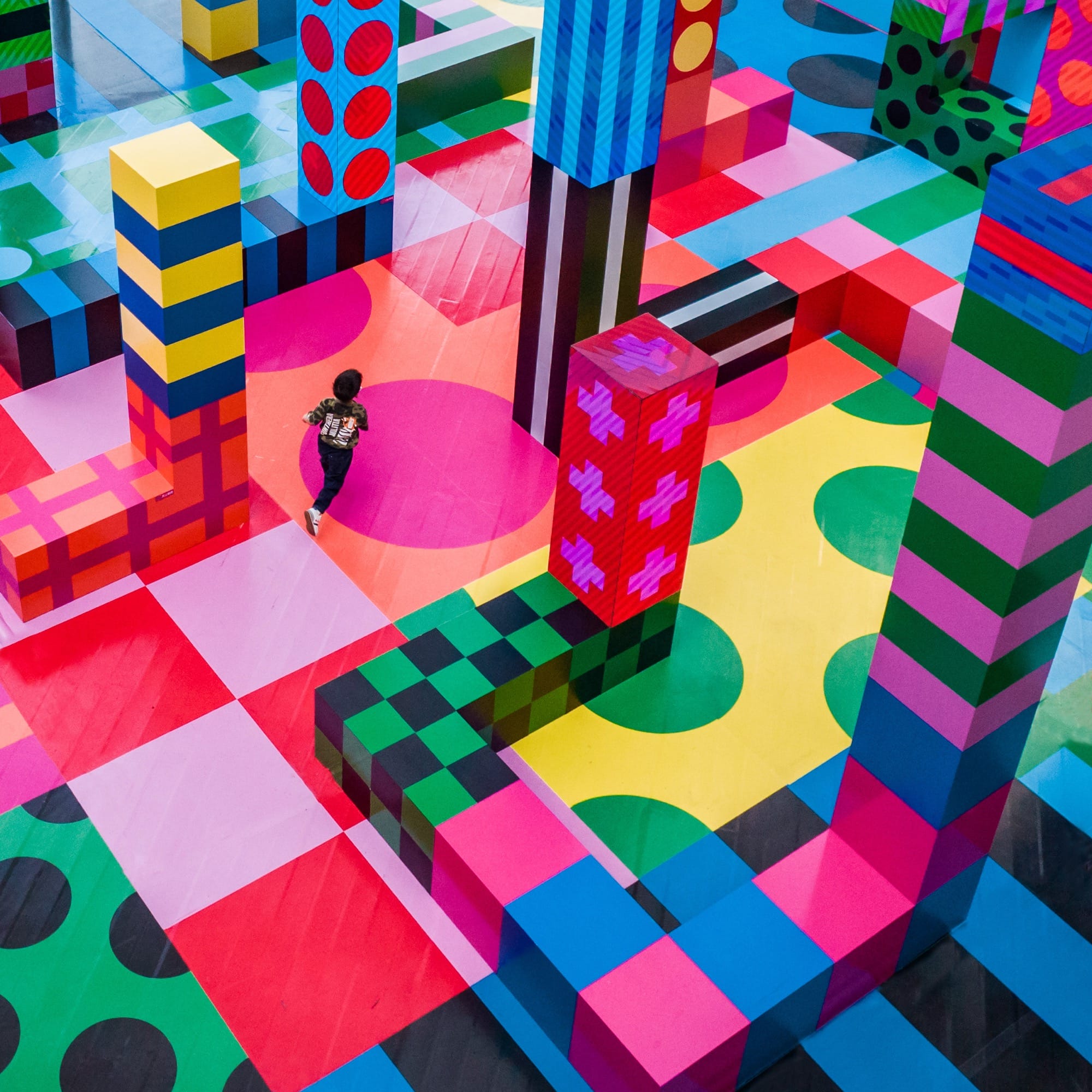 a vibrantly colorful play and seating area in Suzhou designed by Craig & Karl