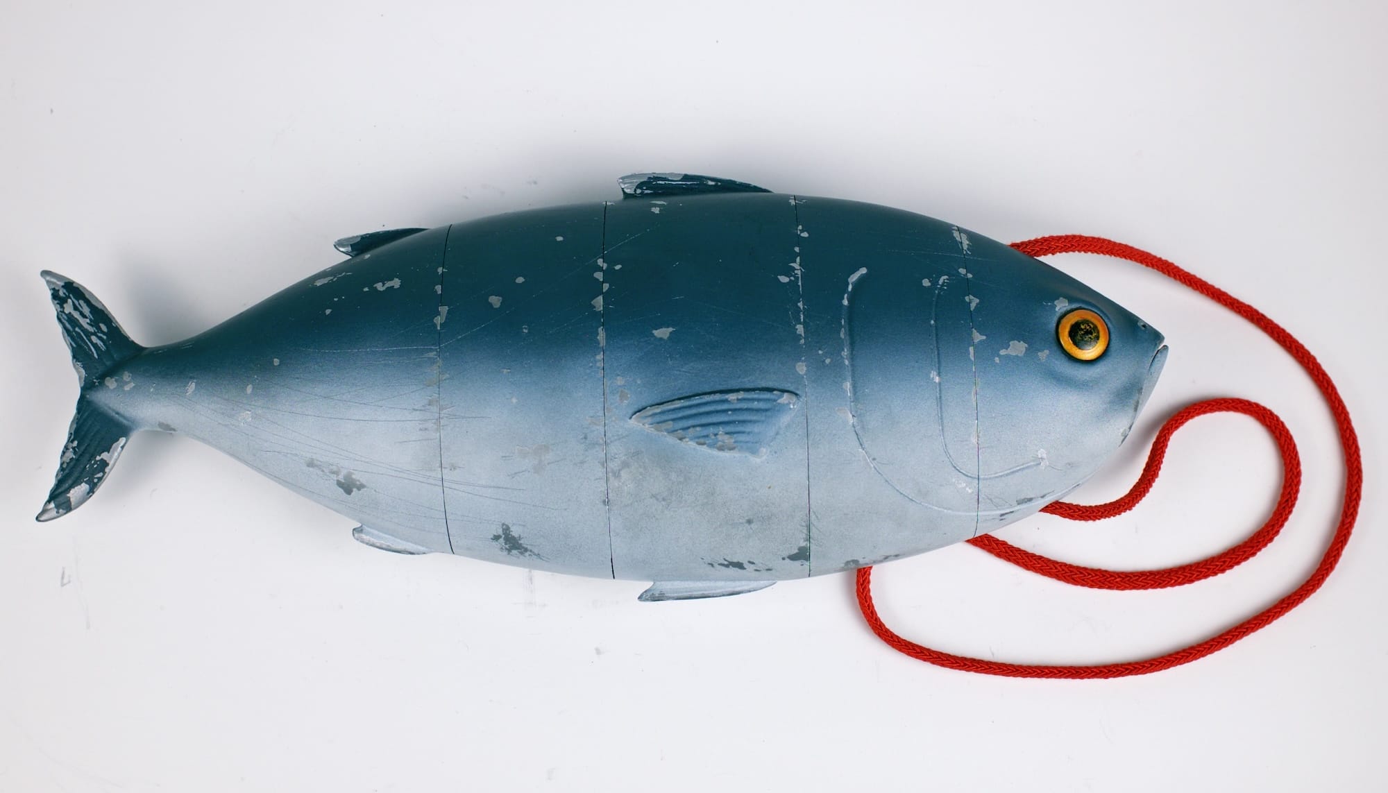 a sculptural purse designed by Paolo Puck in the shape of a fish