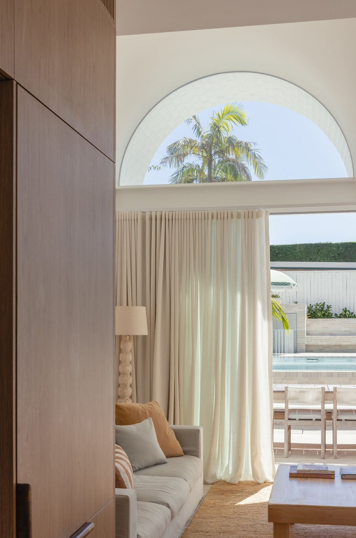 House Is a Playful Dance of Curves bed sofa