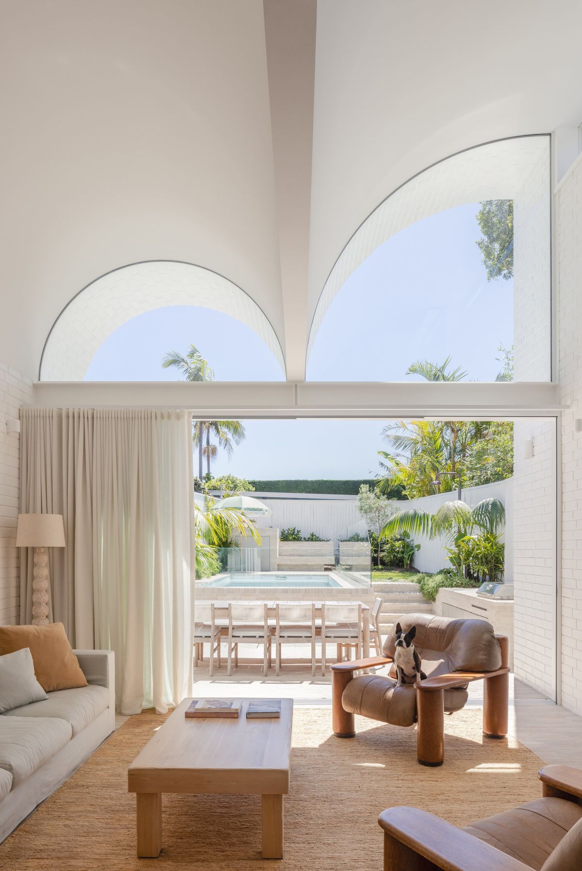 House Is a Playful Dance of Curves cloud windows