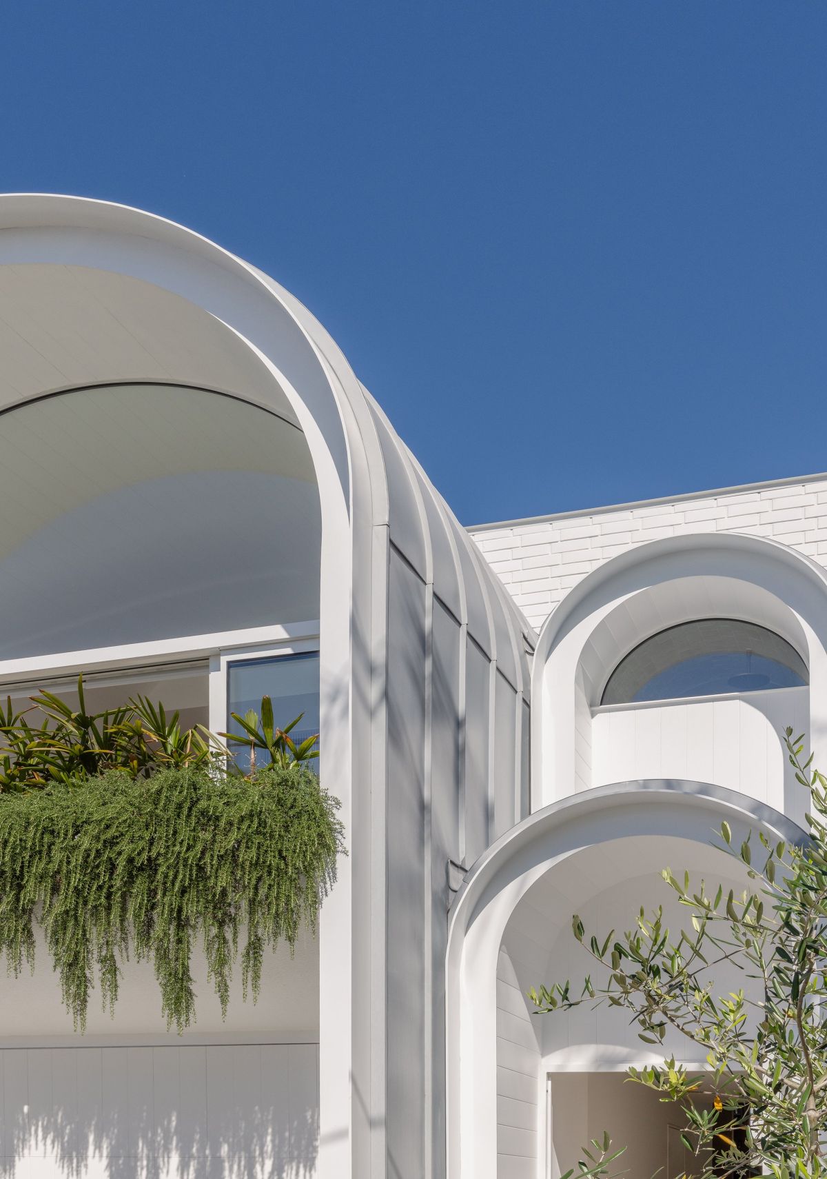 House Is a Playful Dance of Curves exterior house