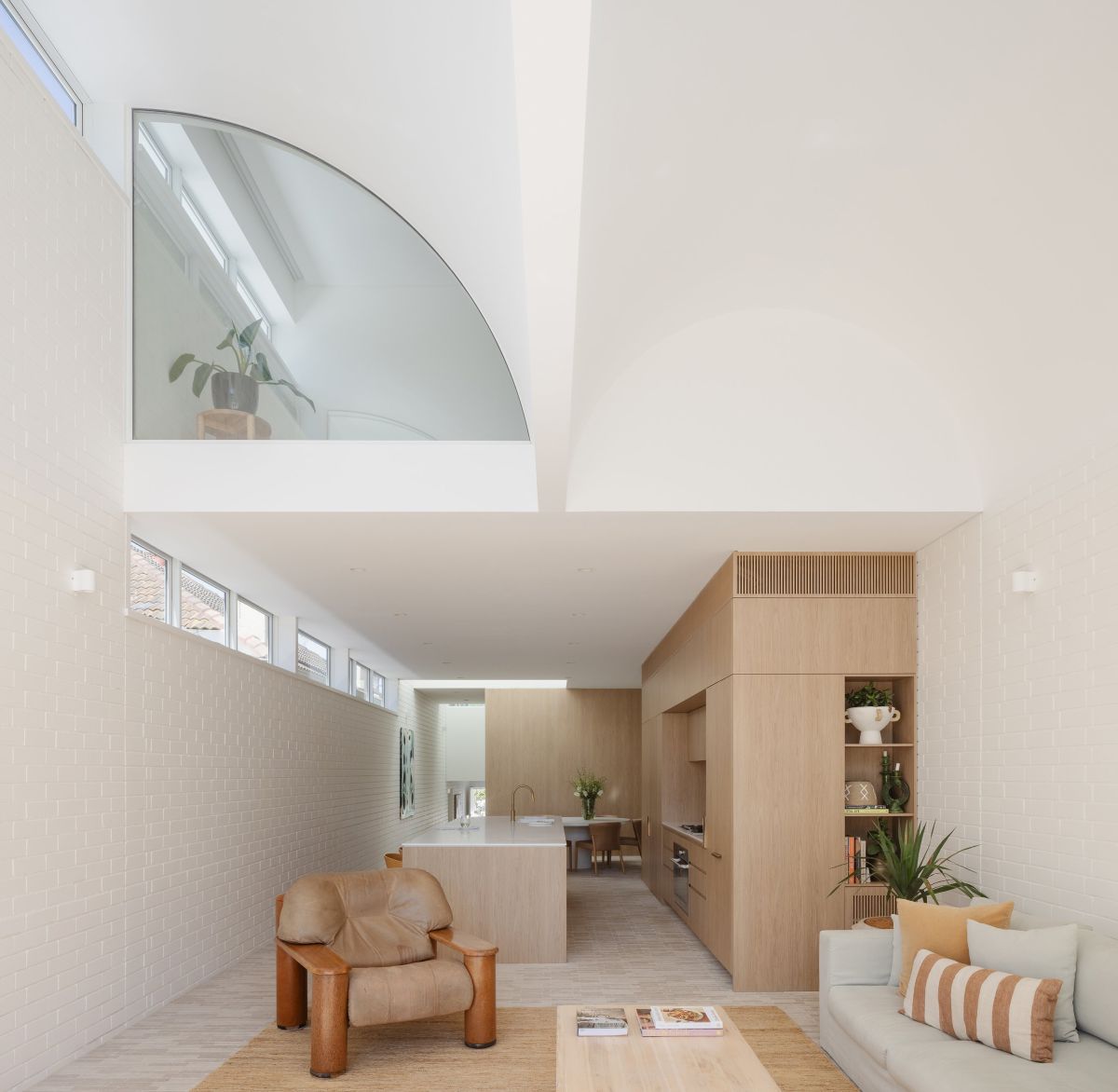 House Is a Playful Dance of Curves interior kitchen