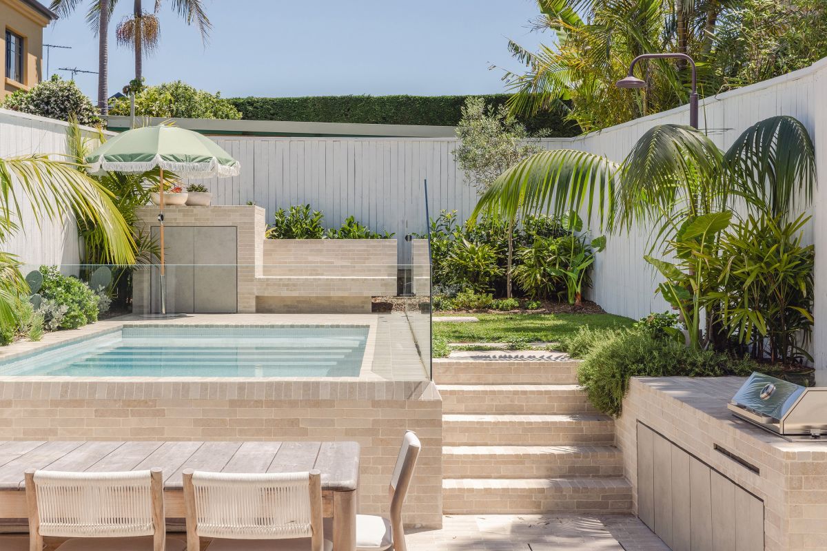 House Is a Playful Dance of Curves pool backyard