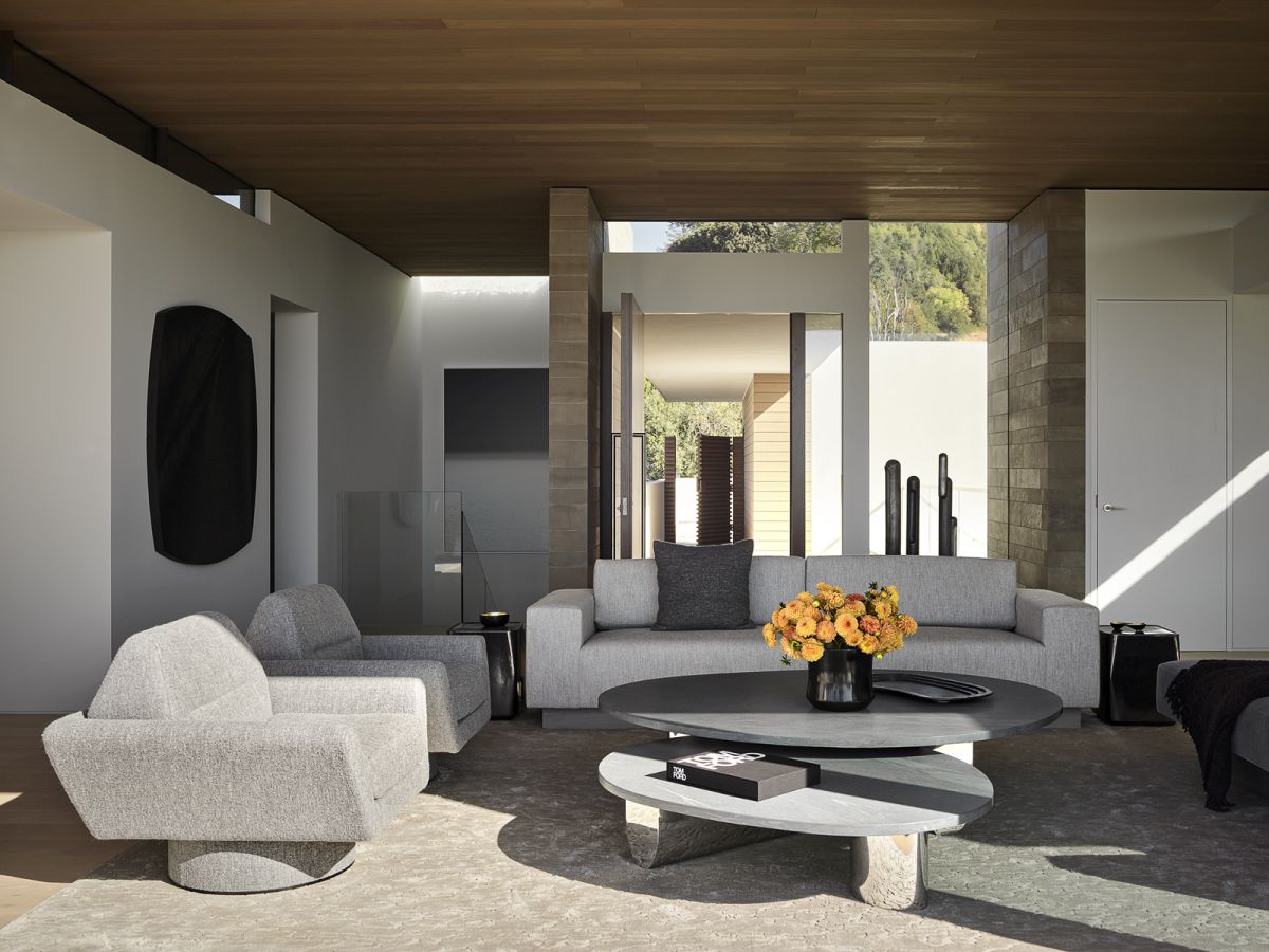 Reseidence by Lagoon View SWATT PARTNERS gray living room seating