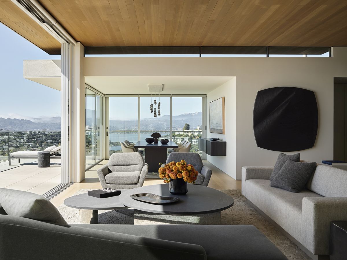 Reseidence by Lagoon View SWATT PARTNERS living room open to balcony