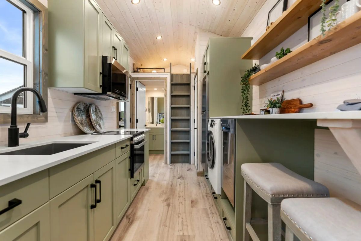 Spacious 38 Foot Tiny Home Built kitchen layout